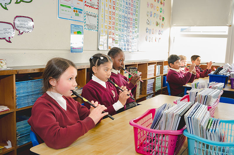 Moyderwell Mercy National School students playing recorders